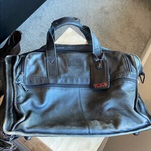 TUMI distressed leather messenger computer bag broken in rugged manly